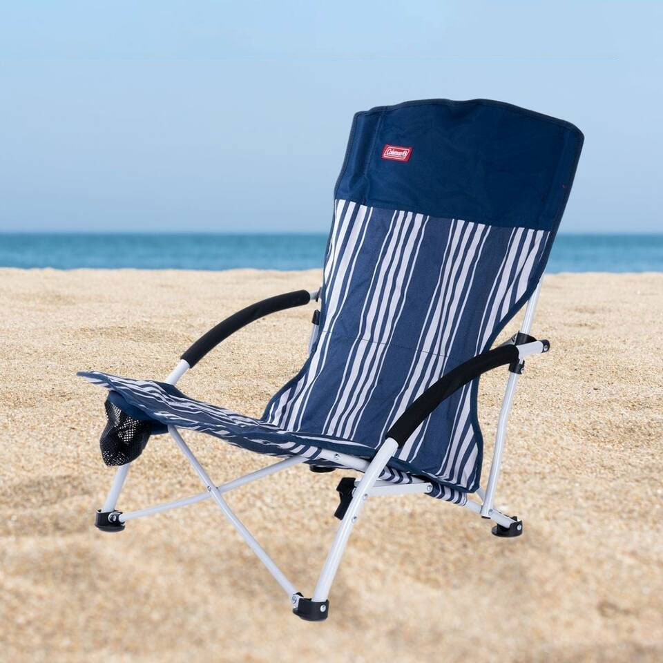 Premium beach chair set up on the sand by the water