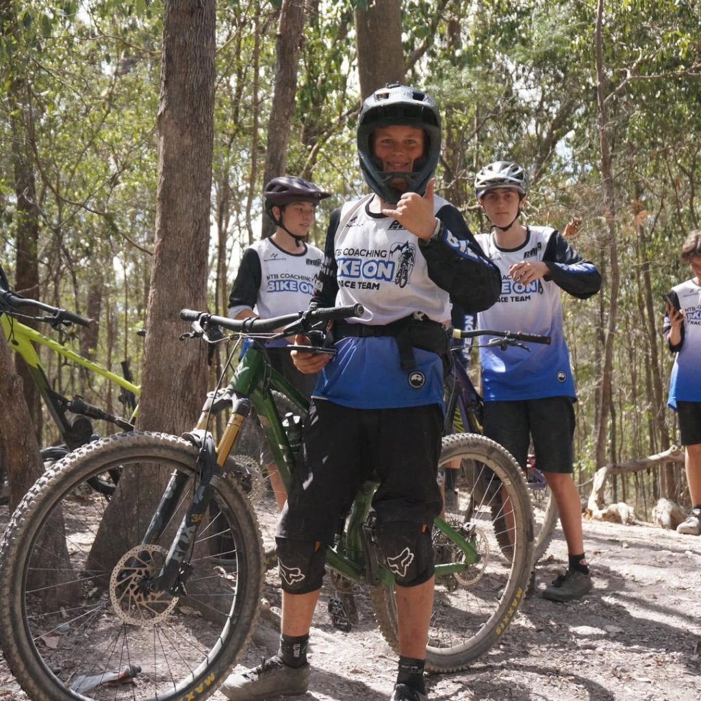 Development Program riders in Bike On jerseys on the trail